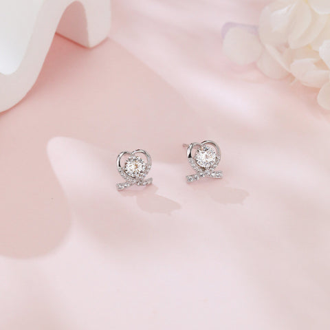 925 Sterling Silver Elegant Heart-shaped Moissanite Earrings In Plated with White Gold With Sparkling Accents
