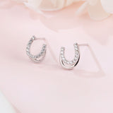 925 Sterling Silver **title:** Elegant Horseshoe Zircon Stud Earrings In Sterling Silver