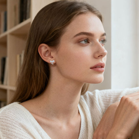 925 Sterling Silver Elegant Zircon-encrusted Plated with White Gold Bow Earrings