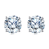 925 Sterling Silver Elegant Sparkling Moissanite Stud Earrings In Plated with White Gold On Blush Pink Backdrop