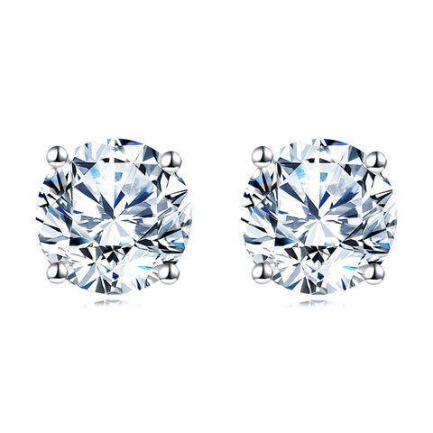 925 Sterling Silver Elegant Sparkling Moissanite Stud Earrings In Plated with White Gold On Blush Pink Backdrop