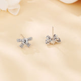 925 Sterling Silver Elegant Moissanite Bow Stud Earrings In Plated with White Gold Setting