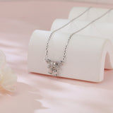 925 Sterling Silver Elegant Moissanite Bow Necklace With Triple Bell Charms