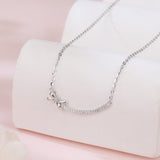 925 Sterling Silver Elegant Silver Zircon Bow Necklace With Curved Bar Pendant