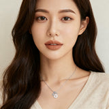 925 Sterling Silver **title:** Elegant Silver Necklace With Zircon Accents, Four-leaf Clover Charm, And Prosperity Symbol Pendant